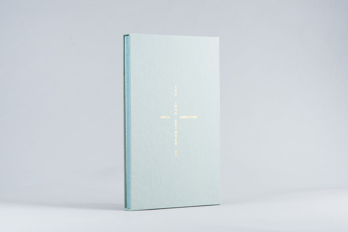 The Land Between Us Sepcial Edition